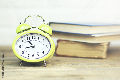 clock on books