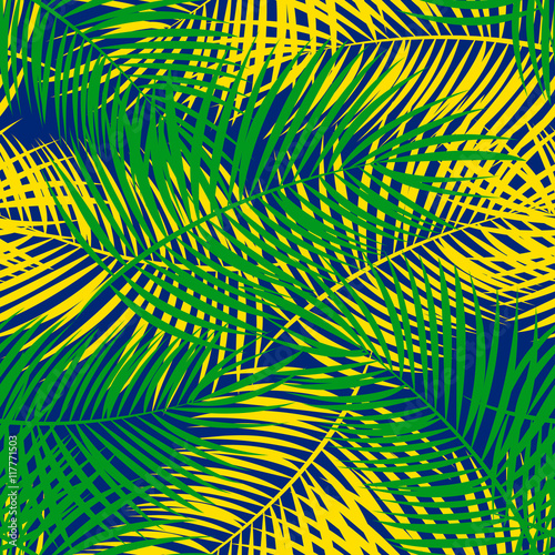 Seamless pattern. The leaves of palm trees with the inscription 