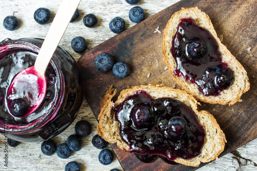 top view of healthy breakfast with blueberry jam photo