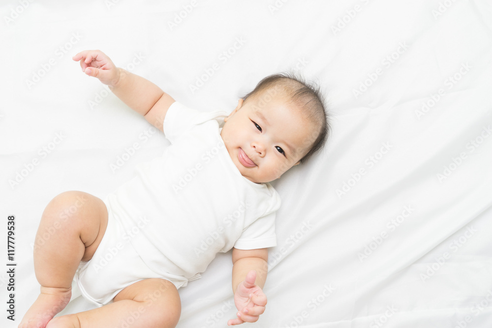 Portrait of a newborn Asian baby on the bed Portrait of a newborn Asian baby on the bed