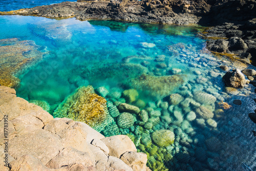 Incredible natural pool at the coastside of lanzarote in nature. Lanzarote. Canary Islands. Spain