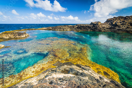Incredible natural pool at the coastside of lanzarote in nature. Lanzarote. Canary Islands. Spain