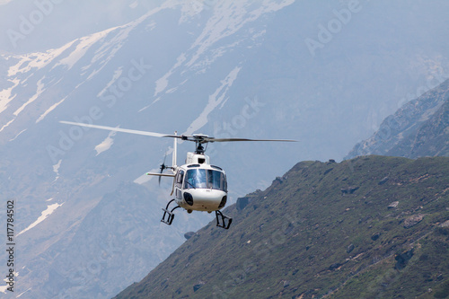 A helicopter transports passengers to the holy shrine of Kedarnath in the Himalayas.