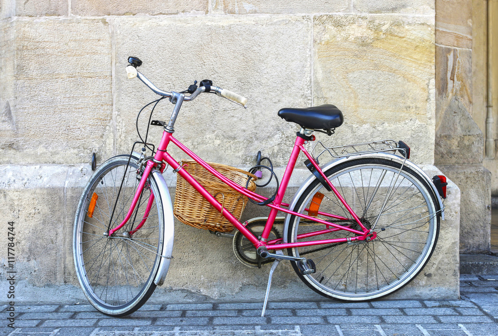 Pink bike in city center of Krakow, Poland. Pink bike in city center of Krakow, Poland.