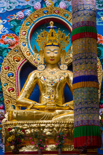 Golden statue of Maitreya in Namdroling Monastery in Bylakuppe, Karnataka, India.