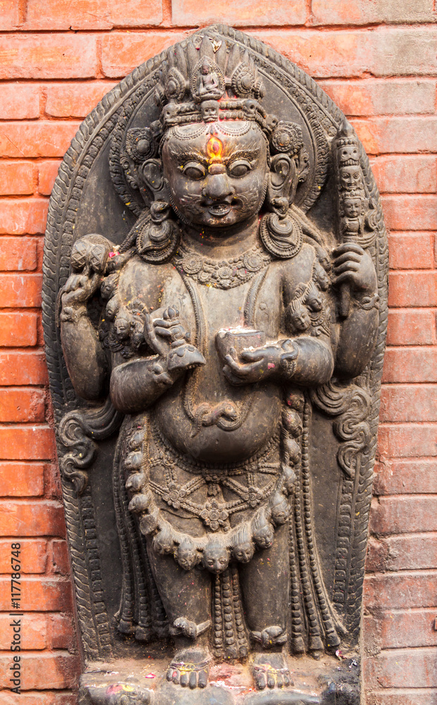 Fototapeta premium A sculpture of a Buddhist god in Svayambhunath, Nepal