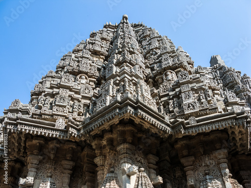 The outside of one of the shrines of Keshava at the 13th Century temple of Somanathapur, Karnataka, South India. photo