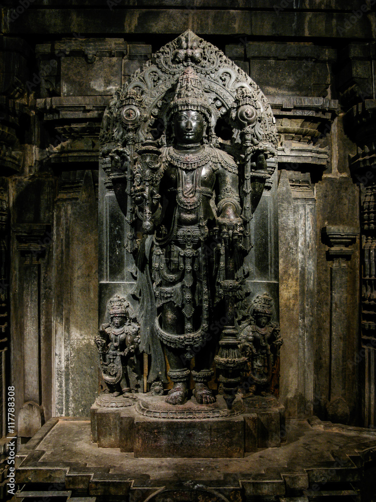 A deity of the Hindu god Vishnu at the 13th Century temple of Somanathapur, Karnataka, South India.