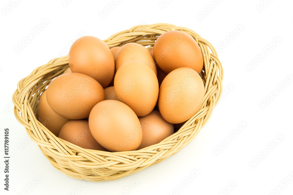 Eggs in basket isolated on white background Eggs in basket isolated on white background