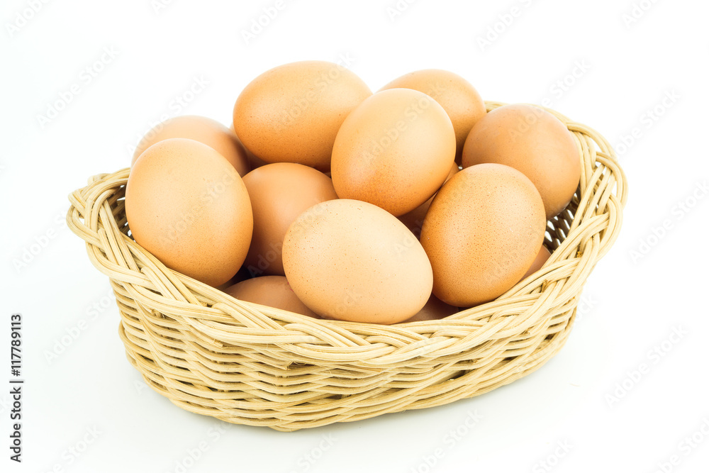 Eggs in basket isolated on white background Eggs in basket isolated on white background