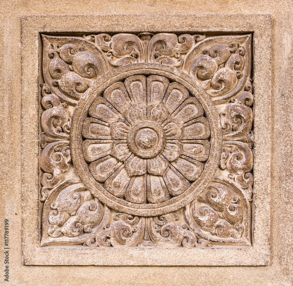 A floral carving at the temple of Kelaniya, Sri Lanka. A floral carving at the temple of Kelaniya, Sri Lanka.