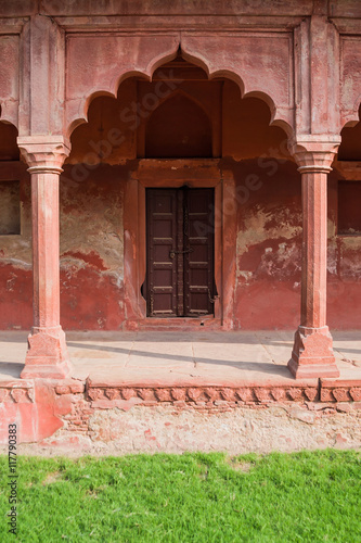 An old sandstone archway in the palace grounds of the Taj Mahal of Agra, India. photo