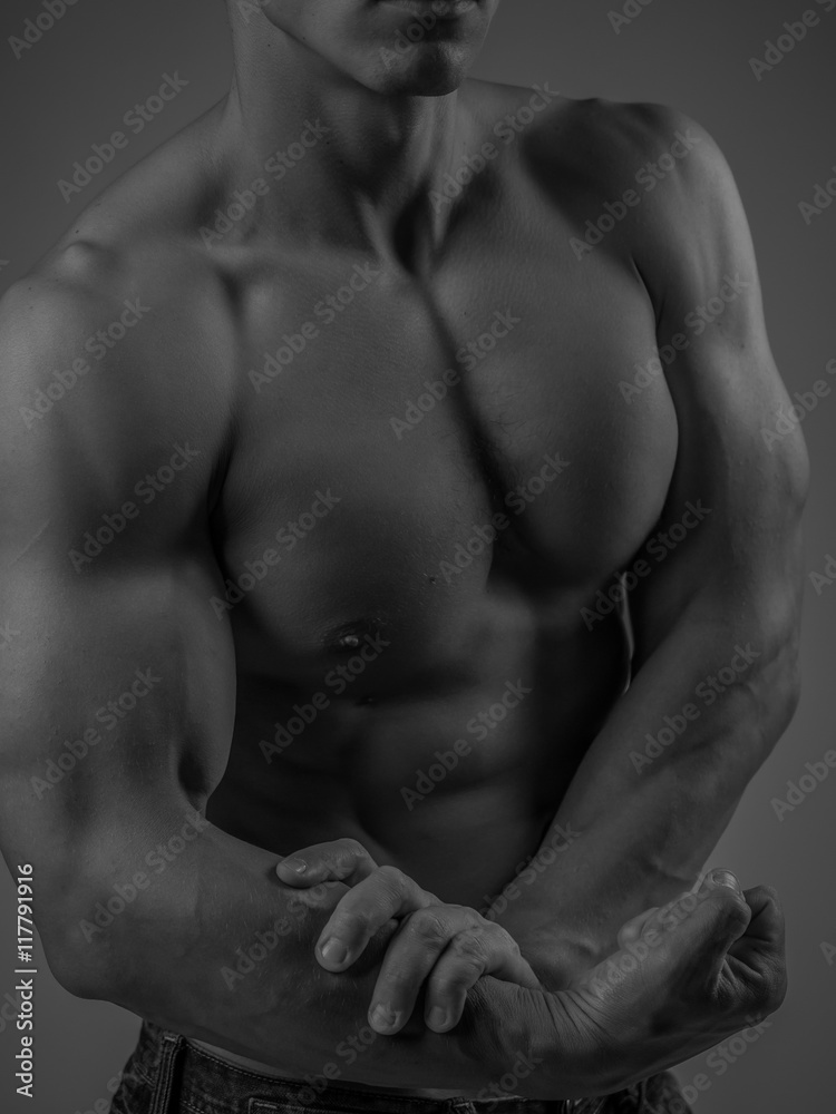Naklejka premium Perfectly fit shirtless young man