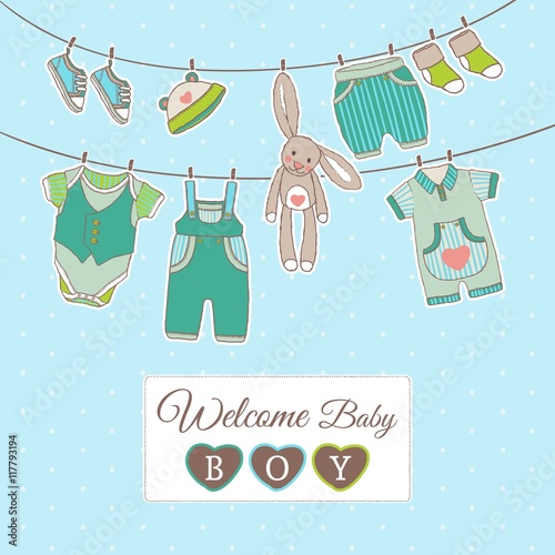 Baby boy card with hanging clothes