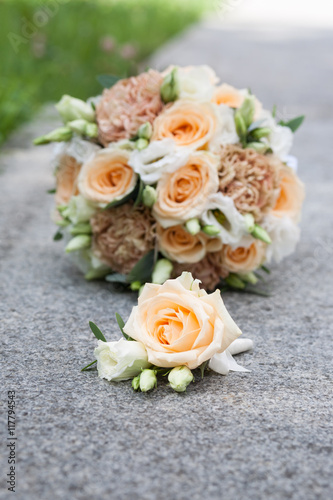 Bridal bouquet. Focus at buttonhole © voynarovskaya