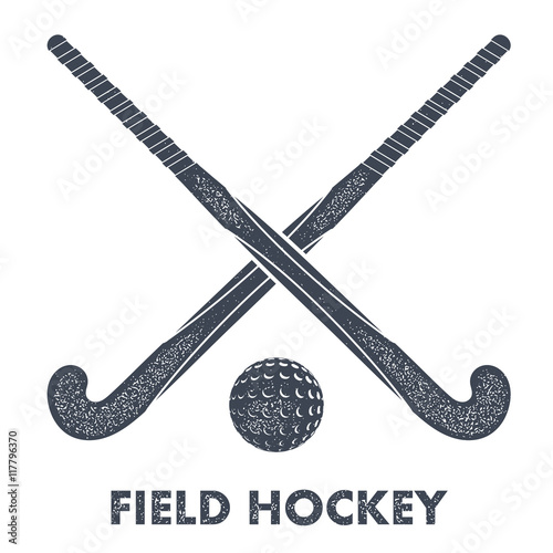 Two black silhouettes sticks for field hockey and ball on a whit