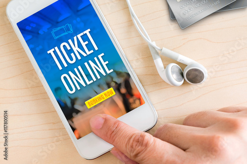 Hand touch smart phone and ear phone with Ticket online word on