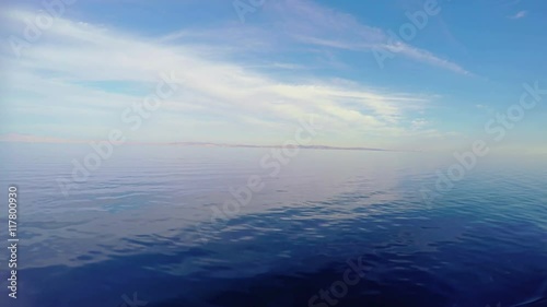 Wallpaper Mural Water surface. Calm water and landscape view from boat. Background with copyspace. 4K video Torontodigital.ca