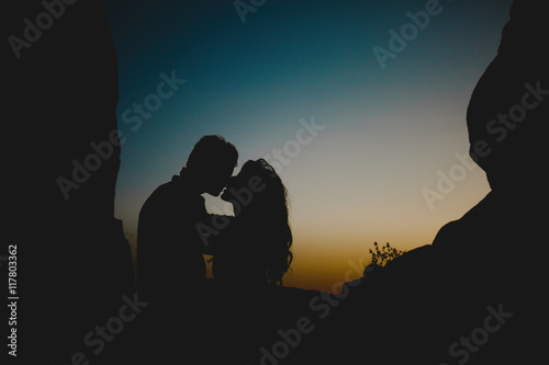 Almost kissing couple in twilight