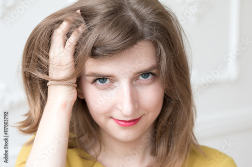 Cool model corrects hairstyle