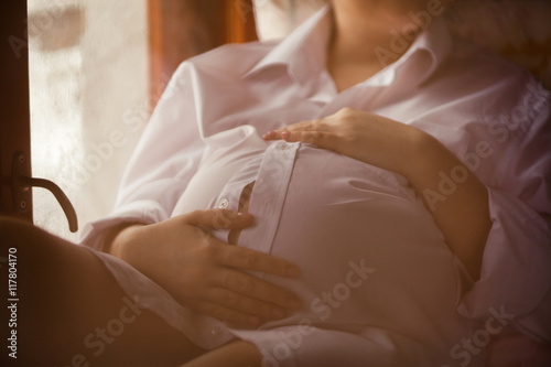 stomach of pregnant woman close up