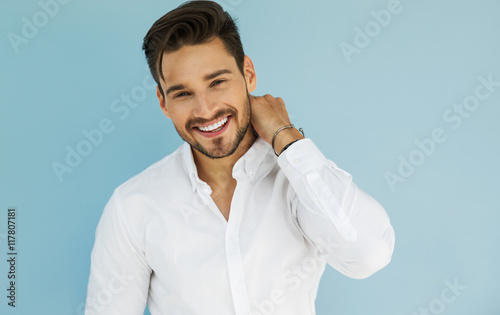 Portrait of sexy smiling male model