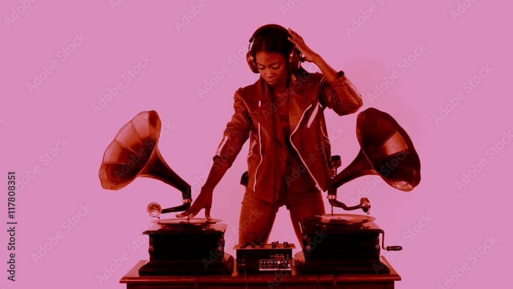 young woman djs using retro antique gramophones