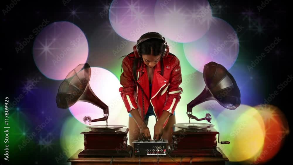 young woman djs using retro antique gramophones