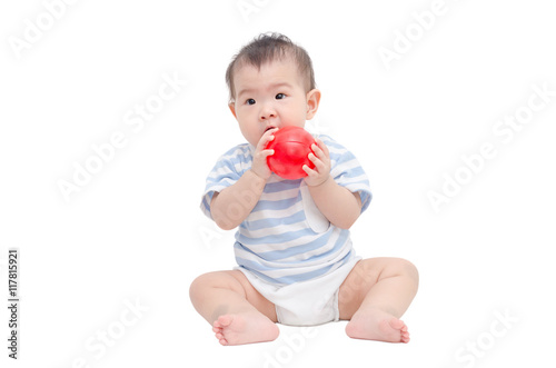Little asian girl playing ball over white background