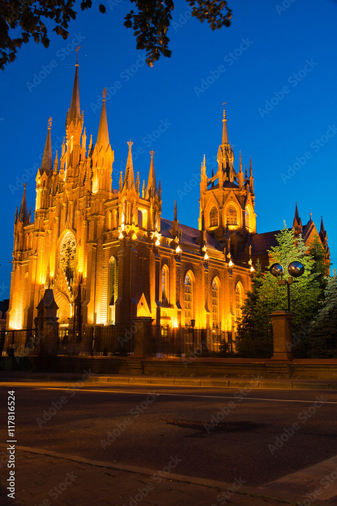 red brick Gothic cathedral on a summer