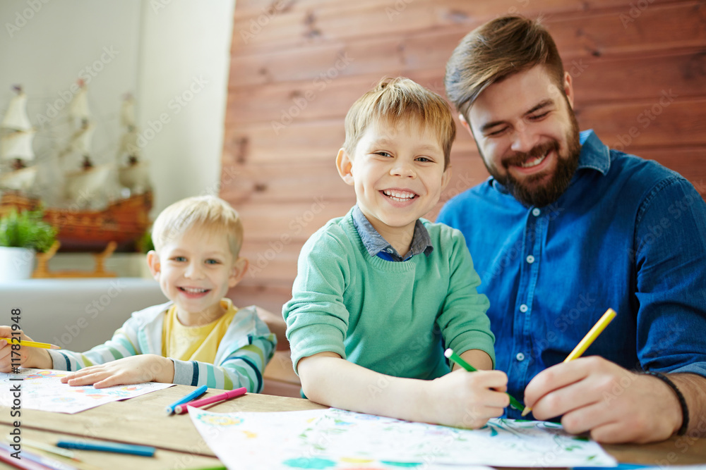Man and boys drawing Man and boys drawing