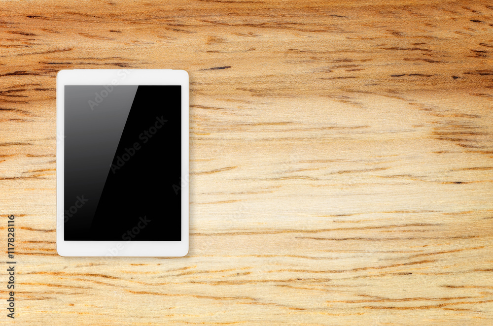 Digital tablet on wooden background. Digital tablet on wooden background.