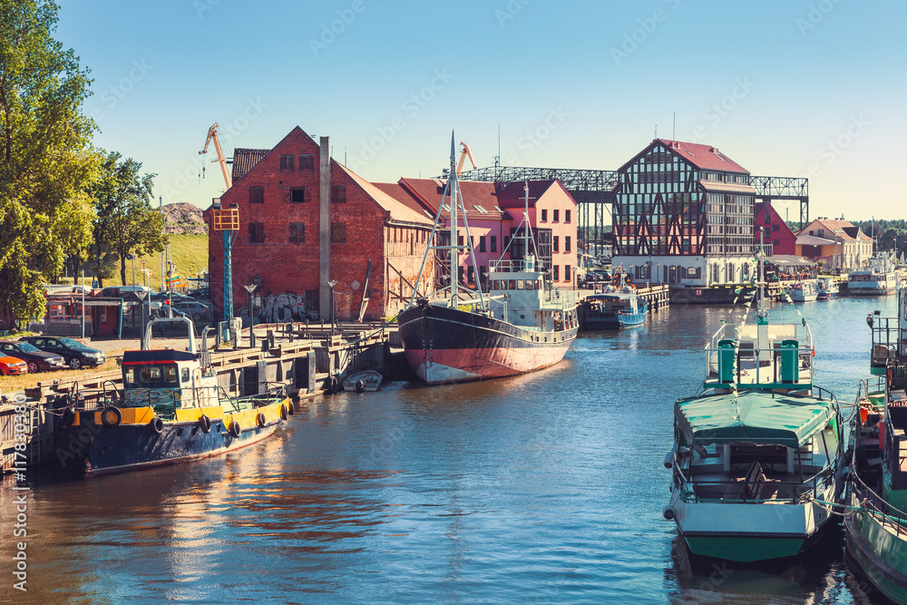 Ships and boats on Dane river in Klaipeda, Lithuania.