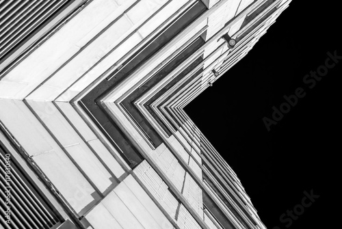 Urban Geometry, looking up to building. Modern architecture black and white, concrete and glass. Abstract architectural design. Inspirational Artistic image and point of view.