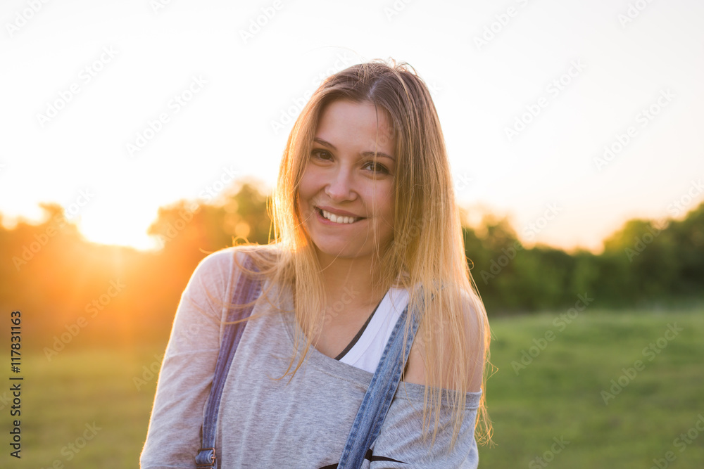 beautiful portrait of carefree friendly approachable girl with a stunning smile and cute looks