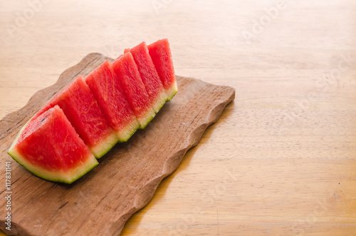 watermelon on wooden board background