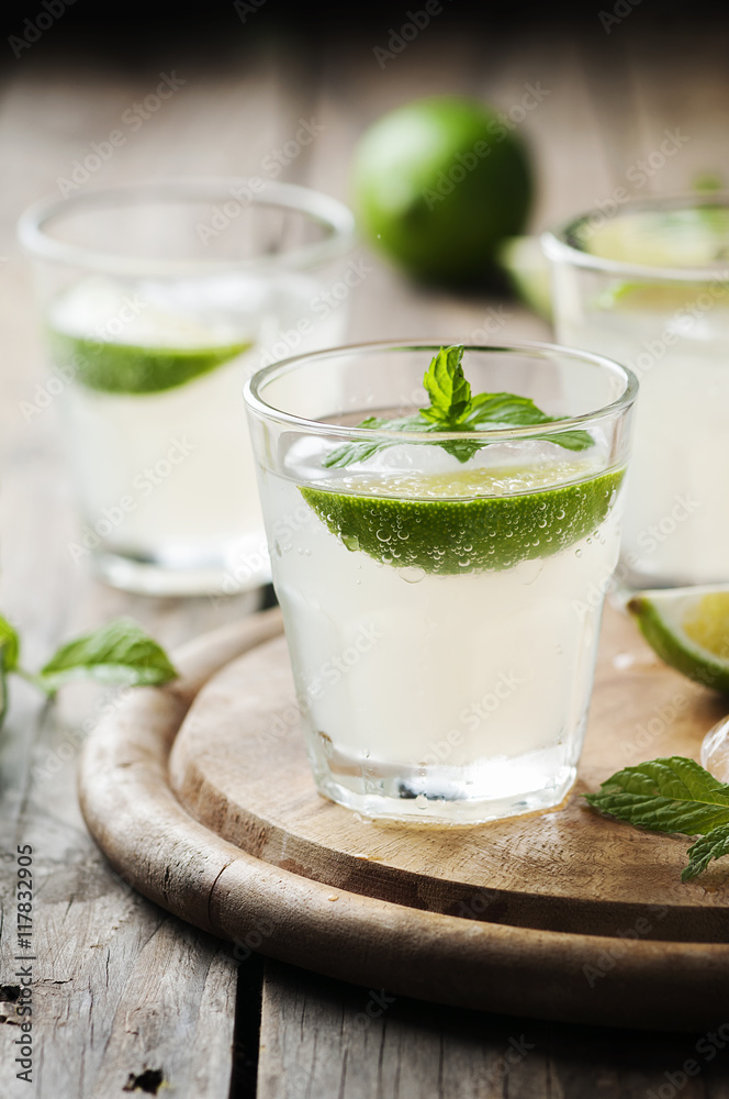 Summer cocktail with lime and mint Summer cocktail with lime and mint