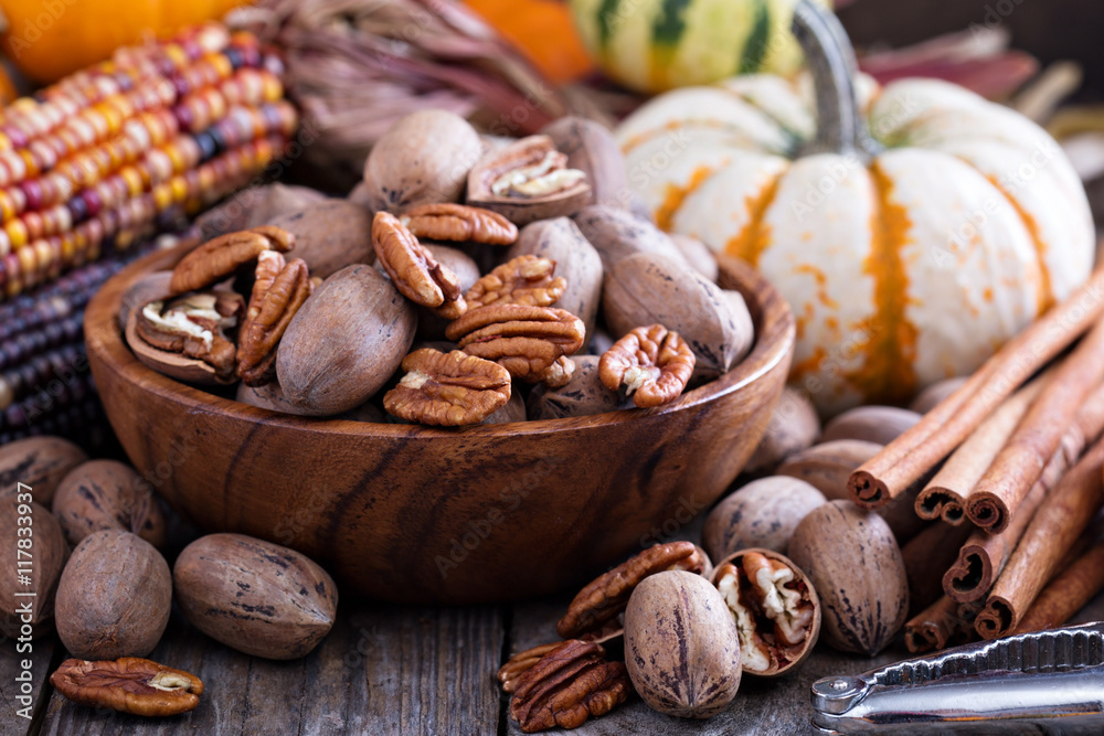 Fall harvest concept - nuts and pumpkins Fall harvest concept - nuts and pumpkins