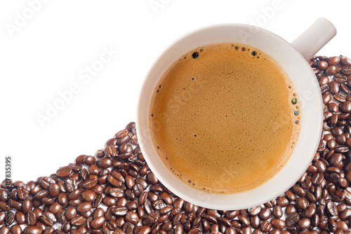 Hot coffee cup with clipping path and coffee beans top view on w
