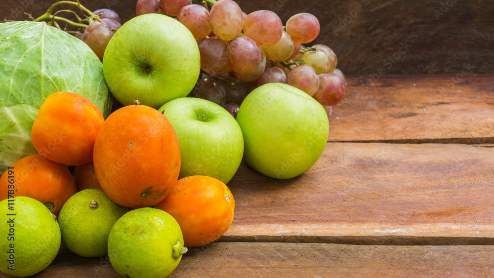 fruits and vegetables on wooden background fruits and vegetables on wooden background