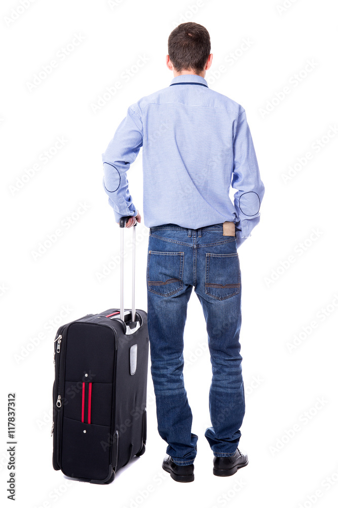 back view of middle aged business man standing with suitcase iso back view of middle aged business man standing with suitcase iso