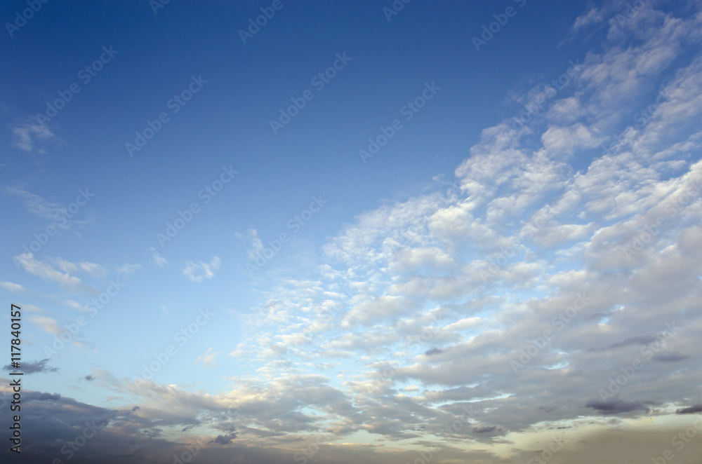 Evening sunset with white clouds and blue sky