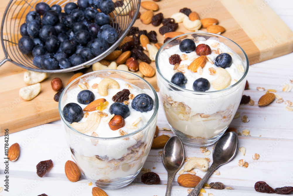 Healthy dessert with yogurt, nuts, oats and blueberries Healthy dessert with yogurt, nuts, oats and blueberries