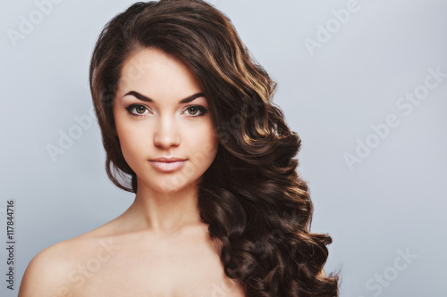 A portrait of beautiful girl with dark hair