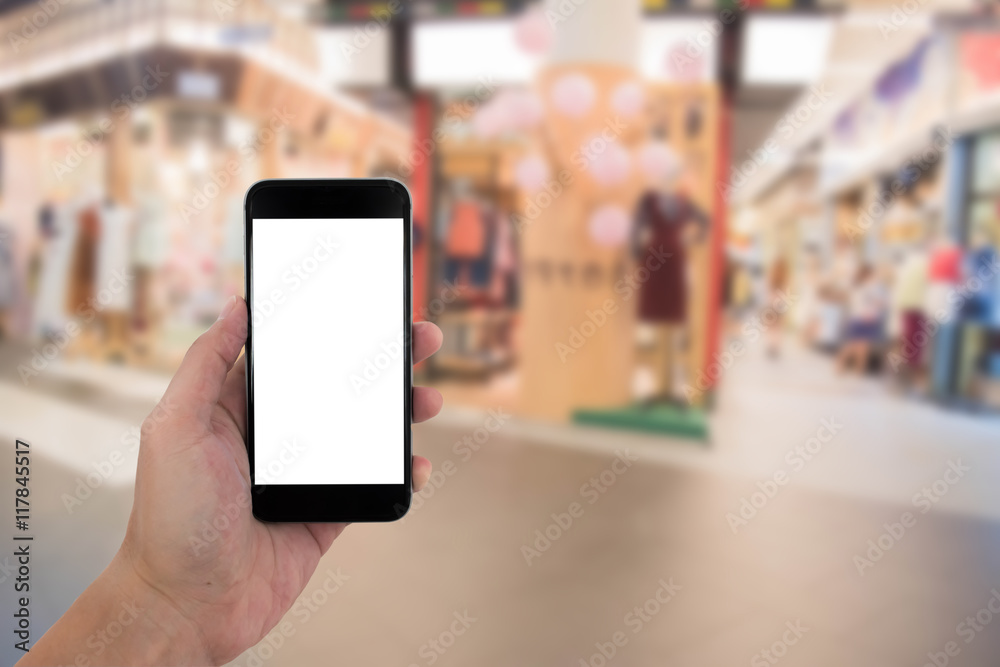 man hand holding the phone and white screen with blur background