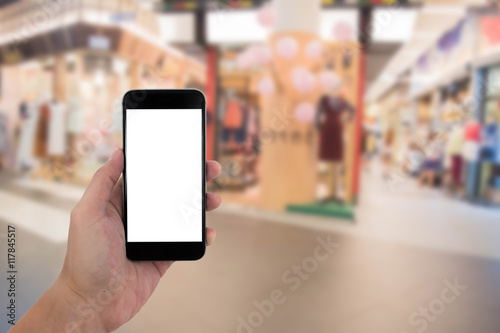 man hand holding the phone and white screen with blur background