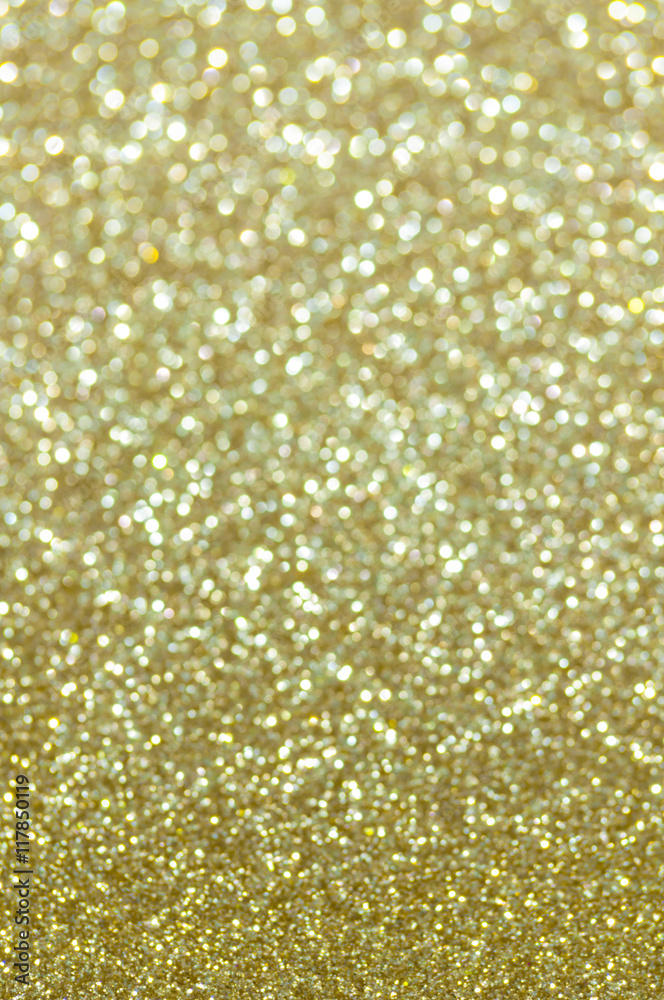 defocused abstract golden lights background defocused abstract golden lights background