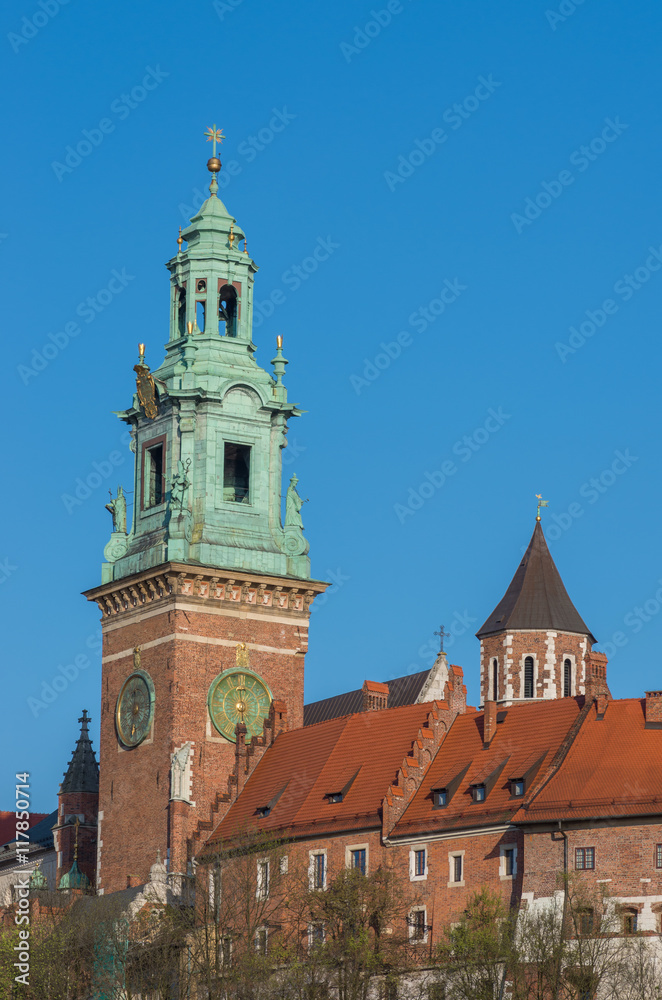 Towers of Wawel cathedral over Wawel castle on sunny afternoon