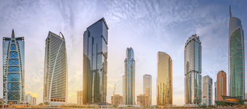 Photography Panoramic view of Business bay and Lake Tower, reflection in a river, Dubai UAE