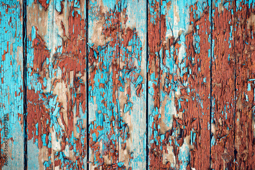 Boards with old paint chips. Background of boards. Painting blue and brown. © DmytroKozak